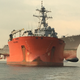 USS John S, McCain is carried aboard the heavy lift transport MV Treasure, Oct. 11, 2017. Treasure will transport John S. McCain to Fleet Activities Yokosuka, Japan for repairs.